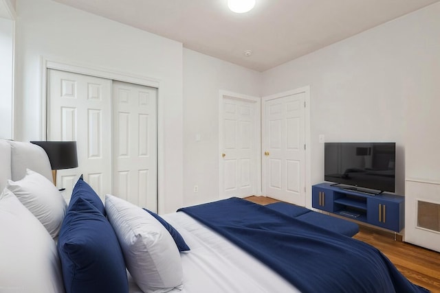 62-64 Saunders Unit K2, Rego Park, NY 11374 - bedroom featuring wood finished floors and a closet