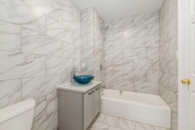 62-64 Saunders Unit K2, Rego Park, NY 11374 - bathroom with vanity, toilet, shower / bathtub combination, marble finish floors, and tile walls