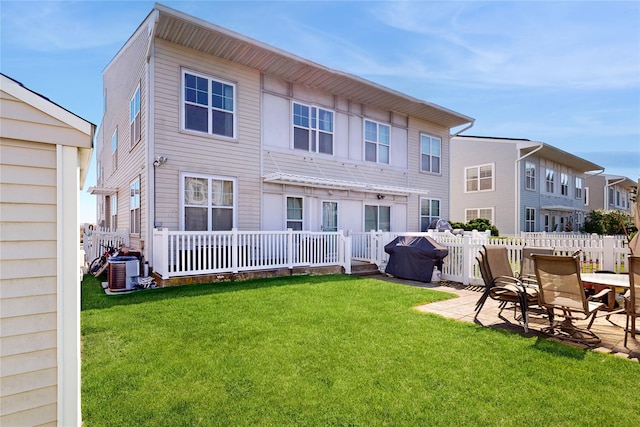 6910 Beach Front Rd, Arverne, NY 11692 - back of property featuring a patio area and central AC