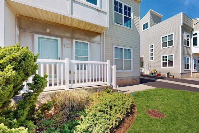 6910 Beach Front Rd, Arverne, NY 11692 - property entrance featuring a yard
