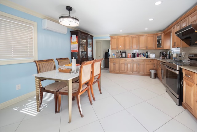 kitchen featuring a wall mounted air conditioner, stainless steel electric range, a sink, ventilation hood, and decorative backsplash