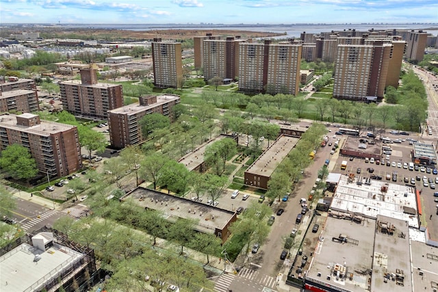 birds eye view of property with a view of city