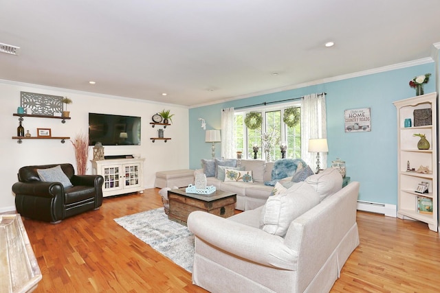 living room with ornamental molding, a baseboard radiator, light wood-style floors, recessed lighting, and baseboards