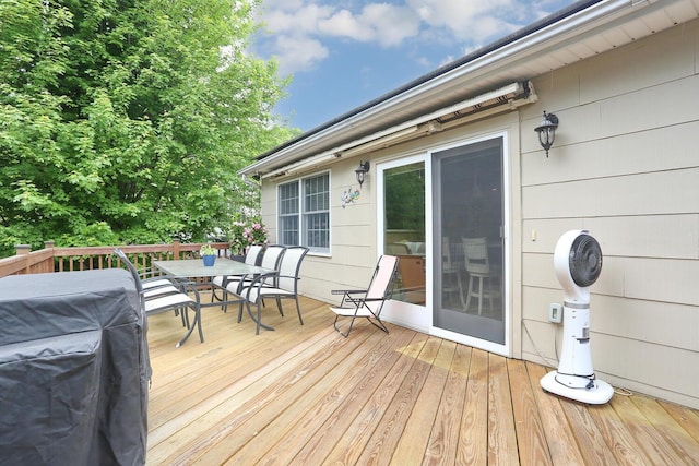deck featuring outdoor dining space