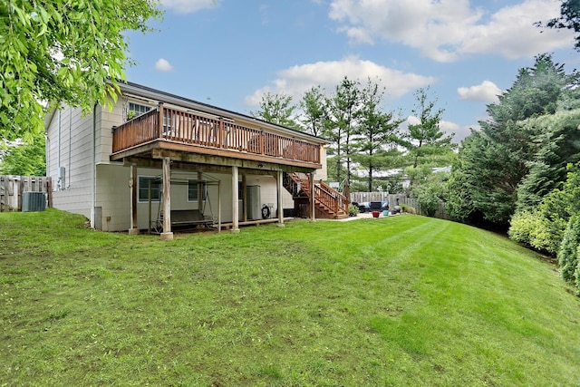 back of house featuring a deck, cooling unit, and stairs