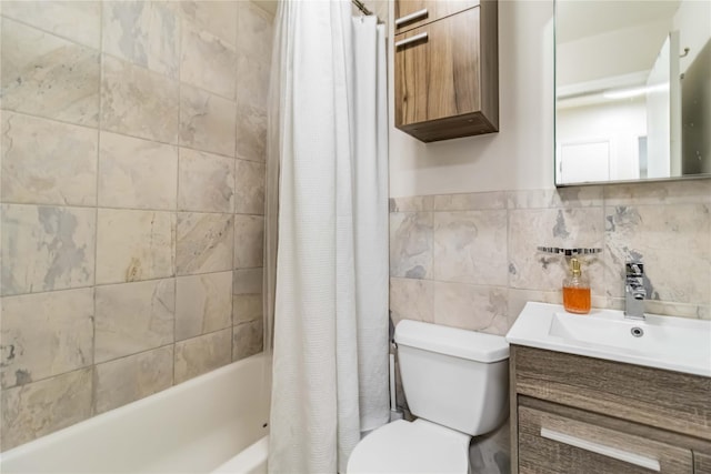 bathroom featuring toilet, tile walls, vanity, and shower / bath combination with curtain