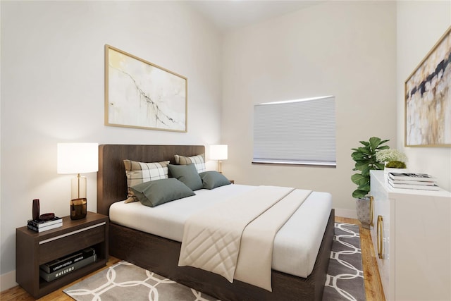 bedroom featuring wood finished floors