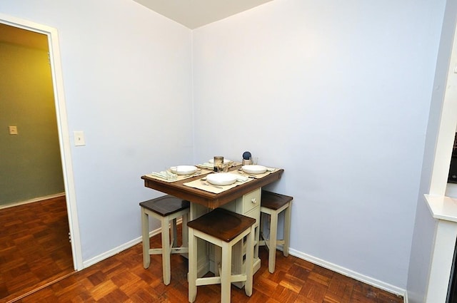 dining room featuring baseboards