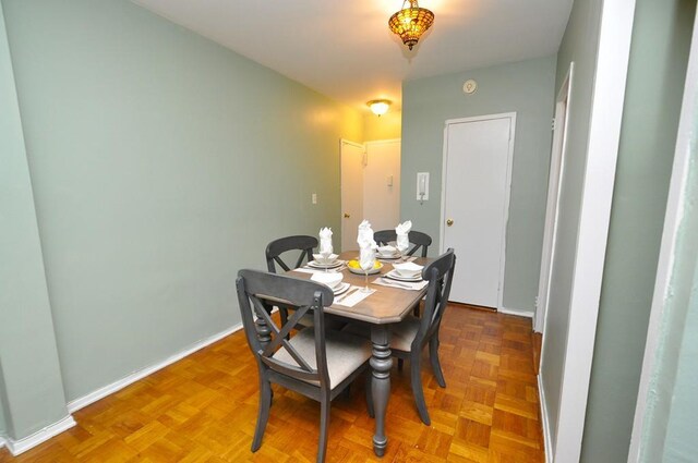 dining room with baseboards
