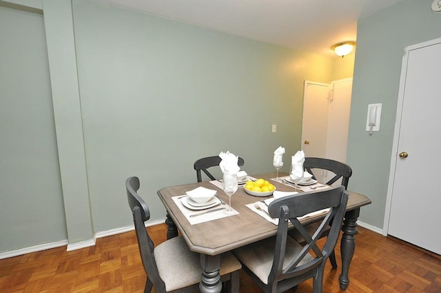 dining space with baseboards