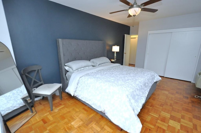 bedroom featuring a closet and ceiling fan