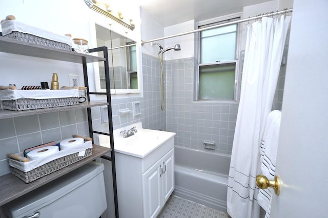 bathroom featuring tile walls, shower / bath combo, vanity, decorative backsplash, and toilet