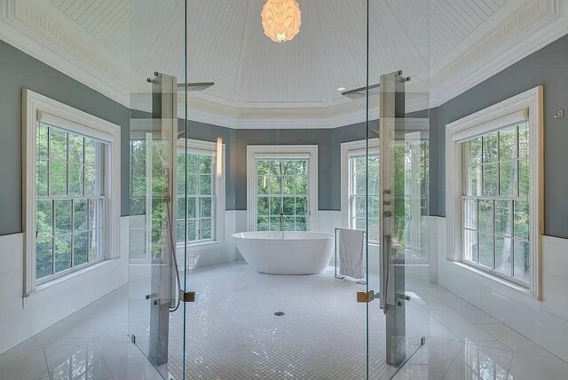 2 Short Path, Nissequogue, NY 11780 - bathroom featuring a freestanding bath, ornamental molding, tile patterned flooring, and plenty of natural light