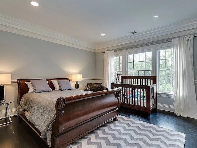 2 Short Path, Nissequogue, NY 11780 - bedroom with multiple windows, crown molding, visible vents, and wood finished floors