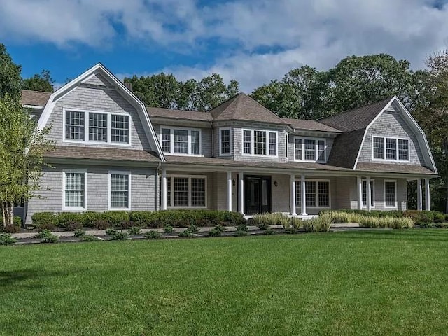 2 Short Path, Nissequogue, NY 11780 - view of front of property with a gambrel roof, a front yard, and a porch