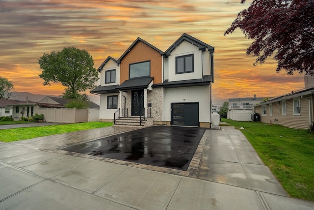 396 Argyle Rd, East Meadow, NY 11554 - contemporary house with asphalt driveway and a garage