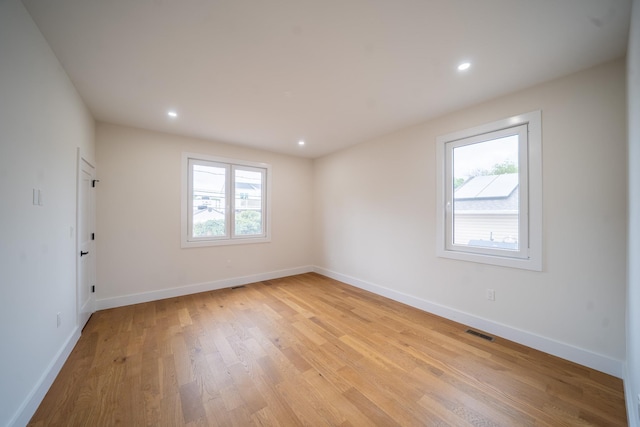 396 Argyle Rd, East Meadow, NY 11554 - spare room featuring light wood-style floors, baseboards, and recessed lighting