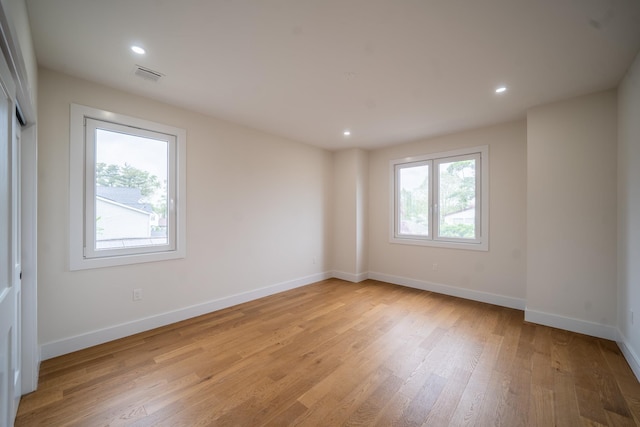 396 Argyle Rd, East Meadow, NY 11554 - empty room with light wood finished floors, baseboards, and recessed lighting
