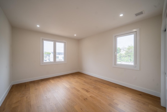396 Argyle Rd, East Meadow, NY 11554 - unfurnished room featuring baseboards, light wood-type flooring, and recessed lighting
