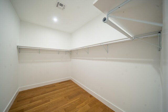 396 Argyle Rd, East Meadow, NY 11554 - spacious closet with light wood-style floors