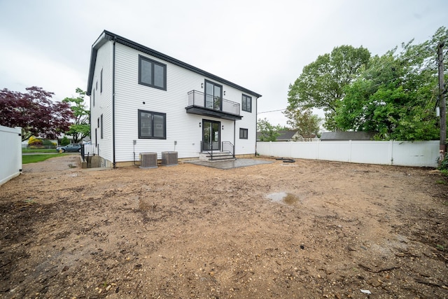 396 Argyle Rd, East Meadow, NY 11554 - back of house featuring fence and cooling unit