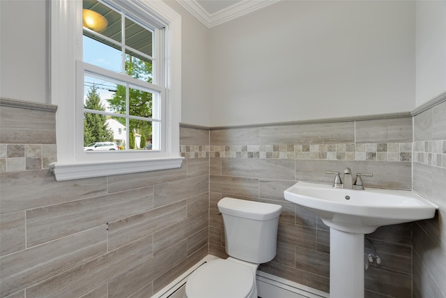 5 Helen Dr, Wappingers Falls, NY 12590 - bathroom featuring toilet, ornamental molding, tile walls, and a sink