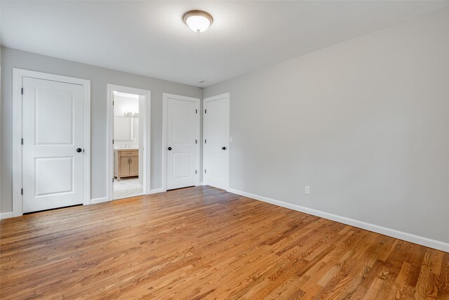 5 Helen Dr, Wappingers Falls, NY 12590 - unfurnished bedroom featuring baseboards and light wood-style floors