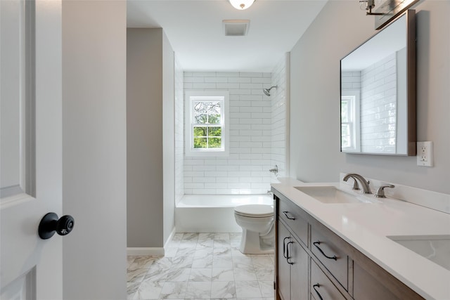 5 Helen Dr, Wappingers Falls, NY 12590 - bathroom with double vanity, marble look tile flooring, toilet, washtub / shower combination, and baseboards