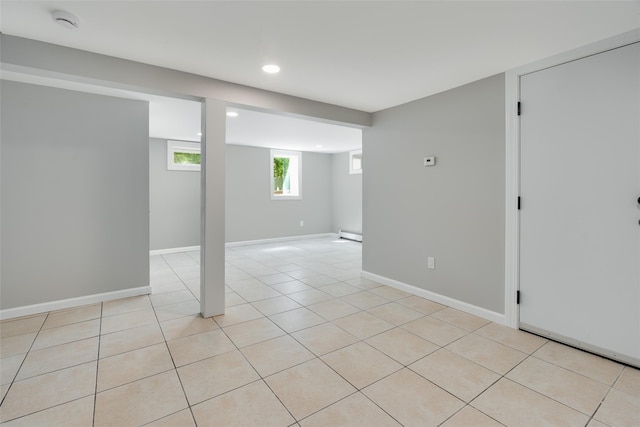 5 Helen Dr, Wappingers Falls, NY 12590 - below grade area with baseboard heating, recessed lighting, baseboards, and light tile patterned flooring