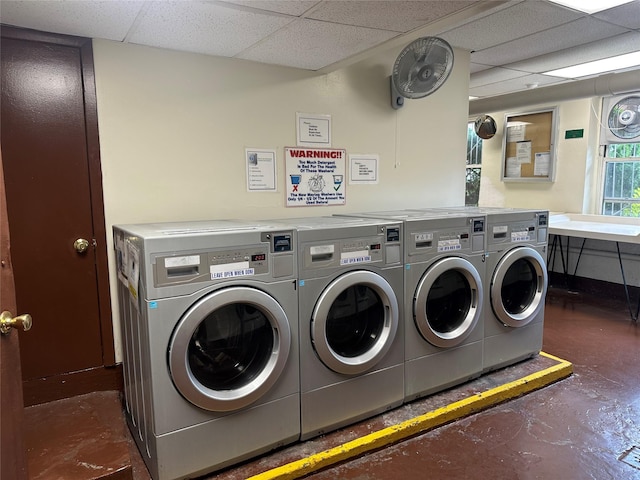 shared laundry featuring separate washer and dryer