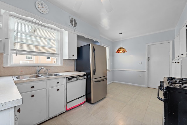 56 W Beech St, Long Beach, NY 11561 - kitchen featuring freestanding refrigerator, white dishwasher, black gas stove, and light countertops