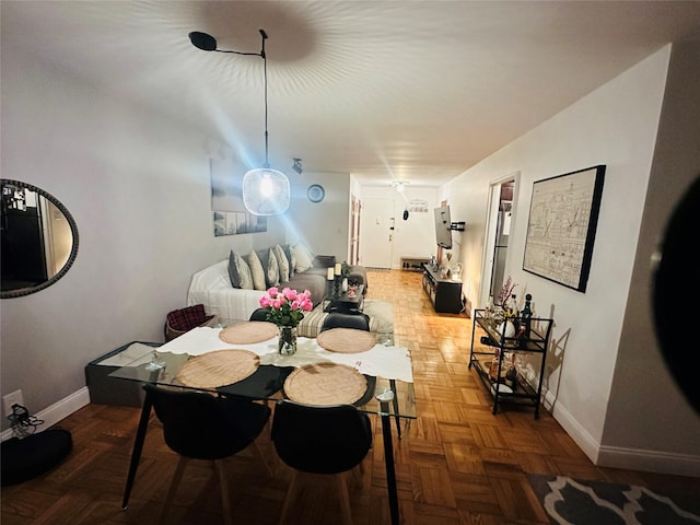dining space with baseboards