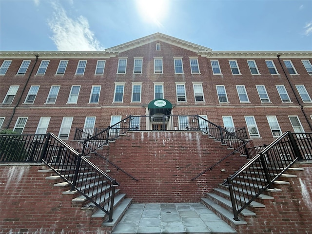 view of property with stairway