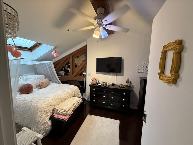bedroom featuring wood finished floors, a ceiling fan, and lofted ceiling