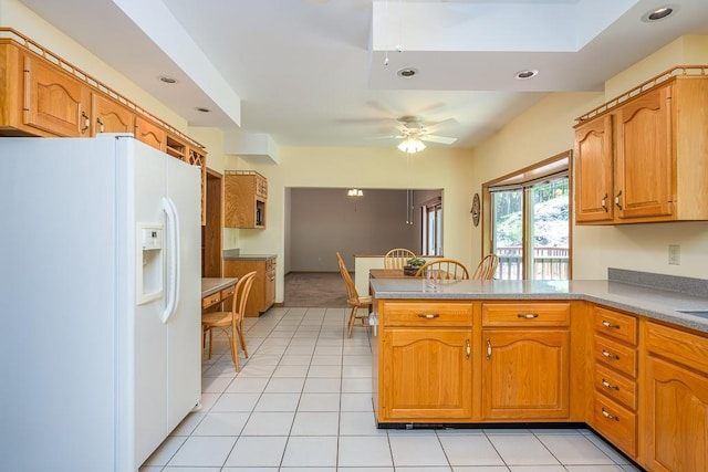 253 W Main St, Stony Point, NY 10980 - kitchen featuring white refrigerator with ice dispenser, a peninsula, recessed lighting, ceiling fan, and light colored carpet