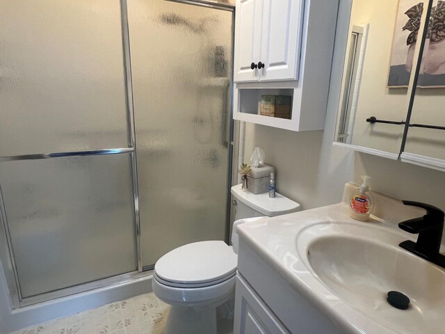 232A Blackpool Ct Unit 232A, Ridge, NY 11961 - full bathroom featuring vanity, toilet, and a stall shower