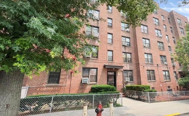 745 E 231st St Unit 1F, Bronx, NY 10466 - view of property featuring cooling unit and fence
