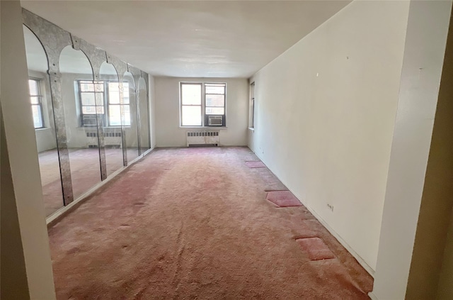745 E 231st St Unit 1F, Bronx, NY 10466 - empty room featuring carpet and radiator heating unit