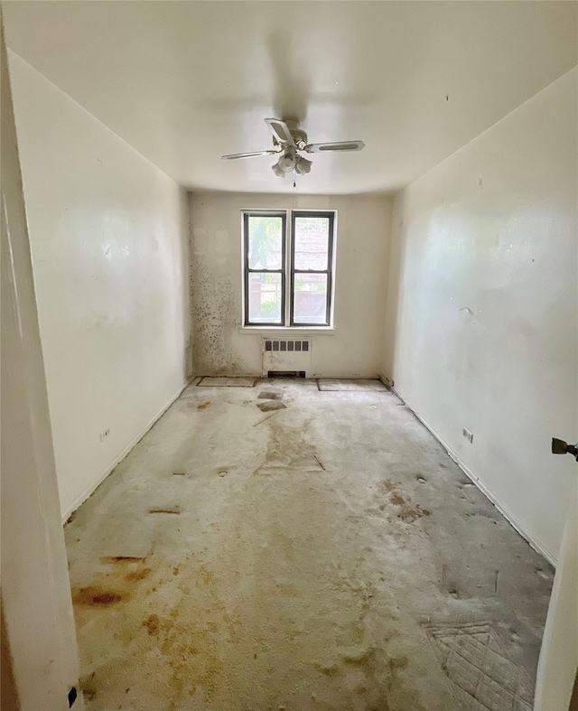 745 E 231st St Unit 1F, Bronx, NY 10466 - empty room featuring radiator and baseboards