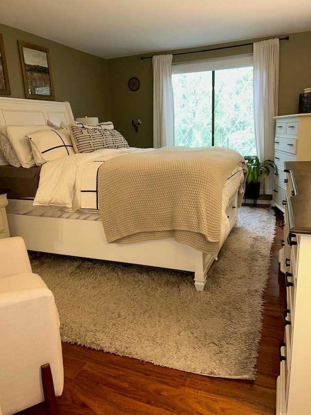 118 Skyline Dr, Coram, NY 11727 - bedroom featuring dark wood finished floors