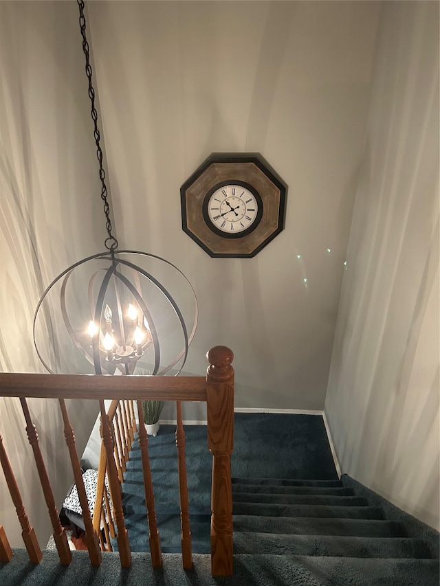118 Skyline Dr, Coram, NY 11727 - staircase with carpet, a chandelier, and baseboards