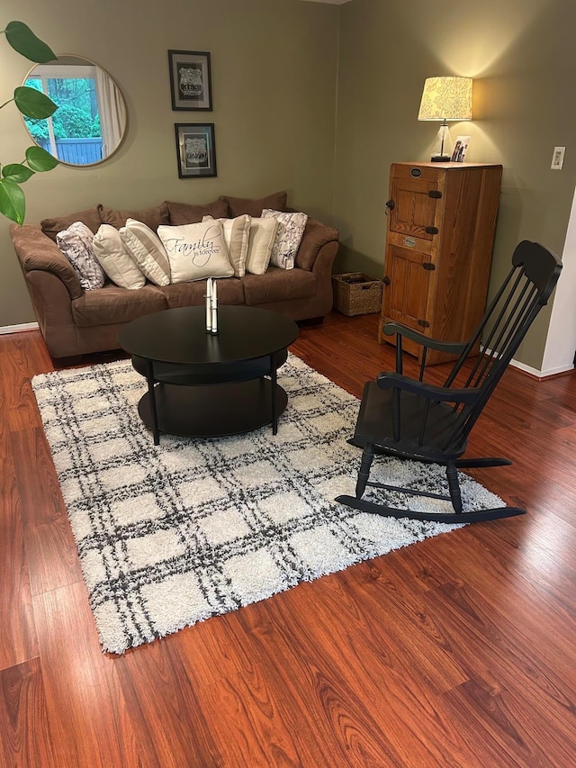 118 Skyline Dr, Coram, NY 11727 - living room with wood finished floors and baseboards