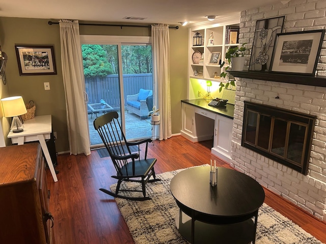 118 Skyline Dr, Coram, NY 11727 - living room featuring dark wood-type flooring and baseboards