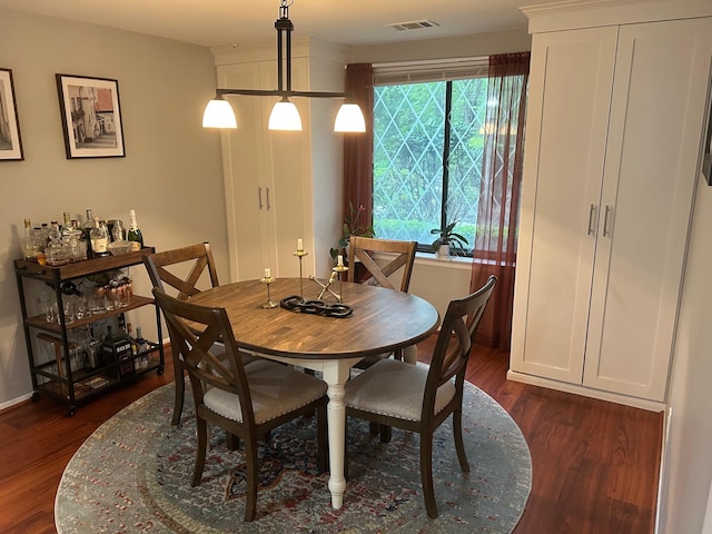 118 Skyline Dr, Coram, NY 11727 - dining space featuring dark wood-style floors