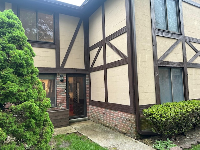118 Skyline Dr, Coram, NY 11727 - doorway to property with brick siding