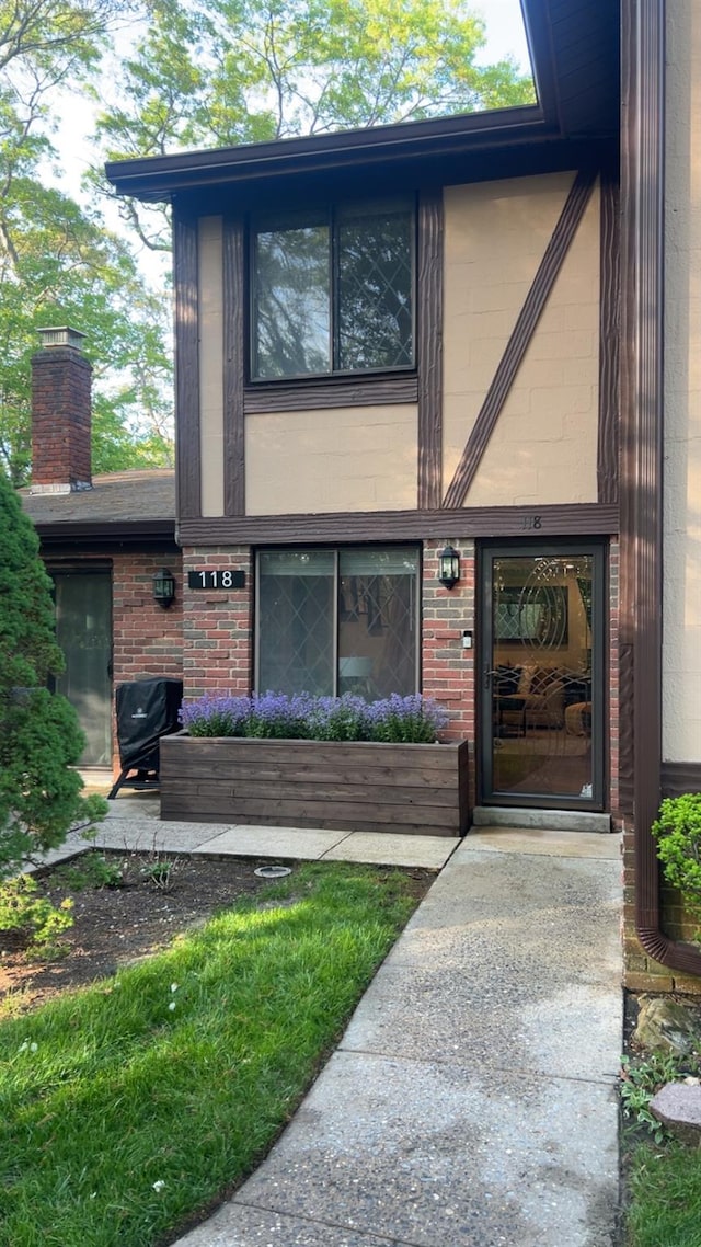 118 Skyline Dr, Coram, NY 11727 - property entrance with brick siding