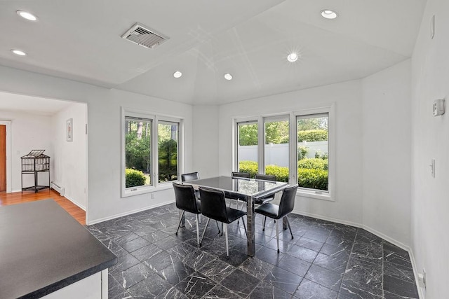 8 Beaumont Dr, New City, NY 10956 - dining area with baseboards, vaulted ceiling, a baseboard heating unit, recessed lighting, and dark marble finish flooring