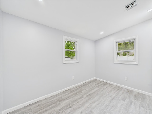 495 Easton St, Ronkonkoma, NY 11779 - spare room featuring light wood-type flooring, plenty of natural light, baseboards, and recessed lighting