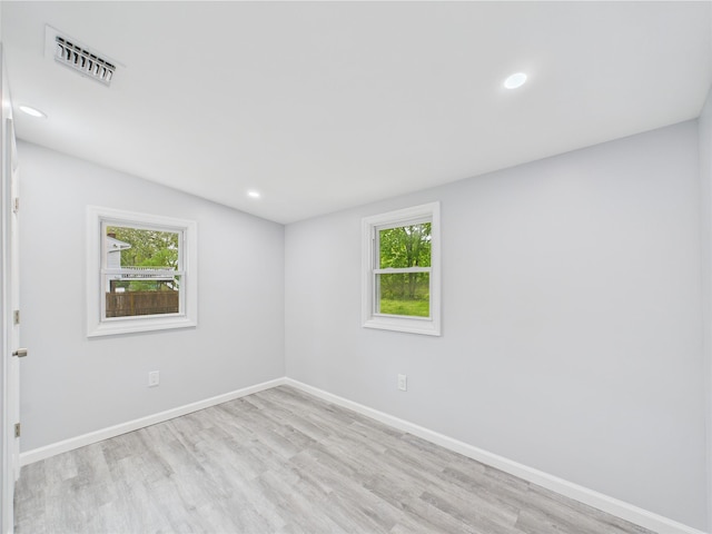 495 Easton St, Ronkonkoma, NY 11779 - empty room with light wood-type flooring, baseboards, and recessed lighting