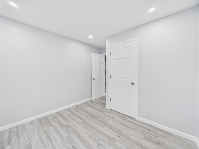 495 Easton St, Ronkonkoma, NY 11779 - spare room featuring light wood-style floors, recessed lighting, and baseboards